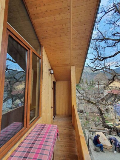 Eco cottage with retro architecture and natural wood interior in Borjomi