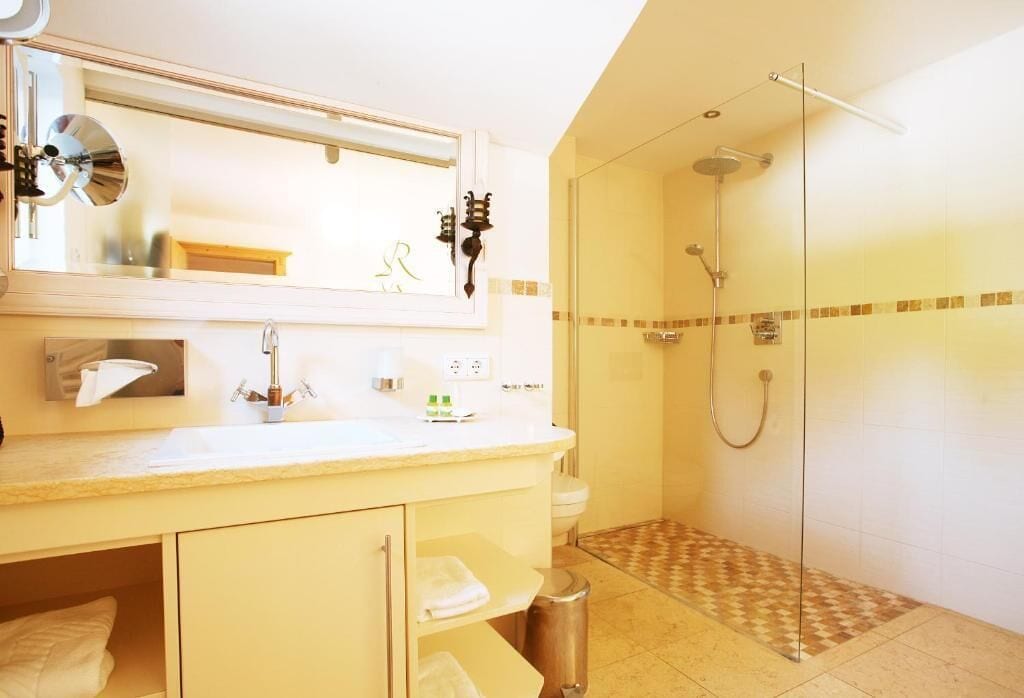 Shower, free toiletries, hair dryer, slippers