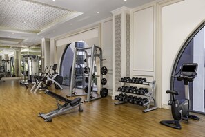 A gym with cardio machines, weightlifting equipment, and dumbbells. - Meliá Vinpearl Hai Phong Rivera (Hai Phong)
