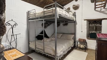 1 dormitori i roba de llit