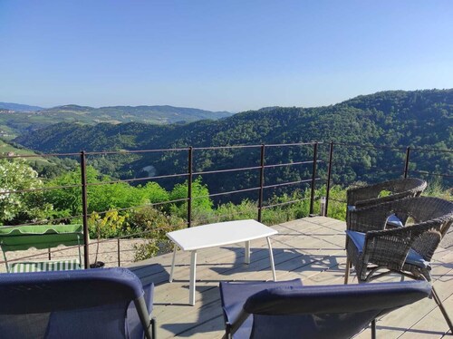 Stone house with swimming pool with whirlpool and patio with terrace on the valley