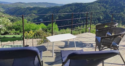 Stone house with swimming pool with whirlpool and patio with terrace on the valley