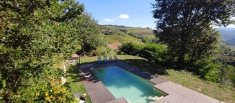 Stone house with swimming pool with whirlpool and patio with terrace on the valley