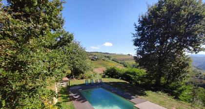 Stone house with swimming pool with whirlpool and patio with terrace on the valley