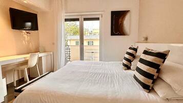 1 habitación, tabla de planchar con plancha, internet y ropa de cama