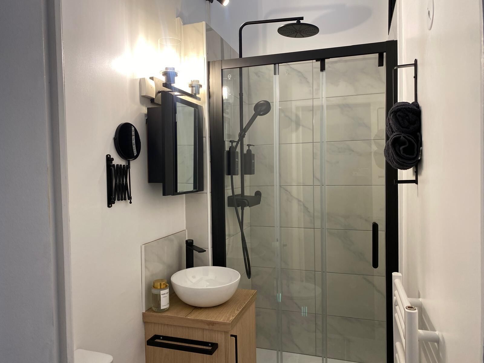 Shower, hair dryer, towels, soap