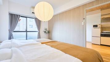 Apartamento básico, para não fumantes, vista para a cidade (802) | Escrivaninha, cortinas blackout, ferros/tábuas de passar roupa