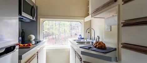 Fridge, microwave, stovetop, coffee/tea maker