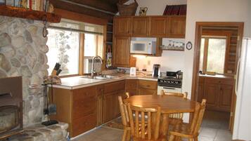 Coffee/tea maker, fridge, microwave, oven