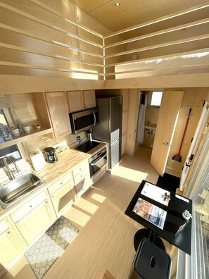 Fridge, stovetop, coffee/tea maker, cookware/dishes/utensils - Secluded Tiny House Oasis in Grand Junction: Nature's Perfect Glamping Hideaway in Colorado (Grand Junction)