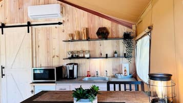 Coffee/tea maker, fridge, microwave, cookware/dishes/utensils