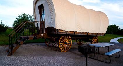 Perfect Glamping Vacations in this Rustic Conestoga Covered Wagon Rental in Oklahoma