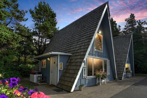 Charming A Frame Nestled Amidst Trees in Otter Rock, Oregon