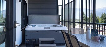 Relax in this 2-bedroom, 2-bath vacation home in Mackenzie Village, featuring a full-size hot tub—perfect for unwinding after a day of adventure.