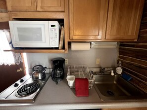 Fridge, microwave, stovetop, coffee/tea maker - Charming Log Cabin with Mountain Views near Trails in Pony, Montana (Pony)