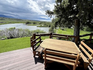 Outdoor dining - Charming Riverside Vacation Rental with Scenic Mountain Views near Ennis, Montana (Ennis)