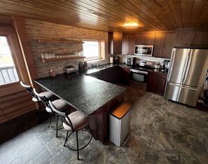 Coffee/tea maker, fridge, microwave, oven