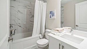 Hair dryer, towels, soap, toilet paper