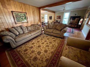 TV, fireplace - Charming Montana Bungalow with Madison River Views, Steps from Main Street in Ennis, MT (Ennis)