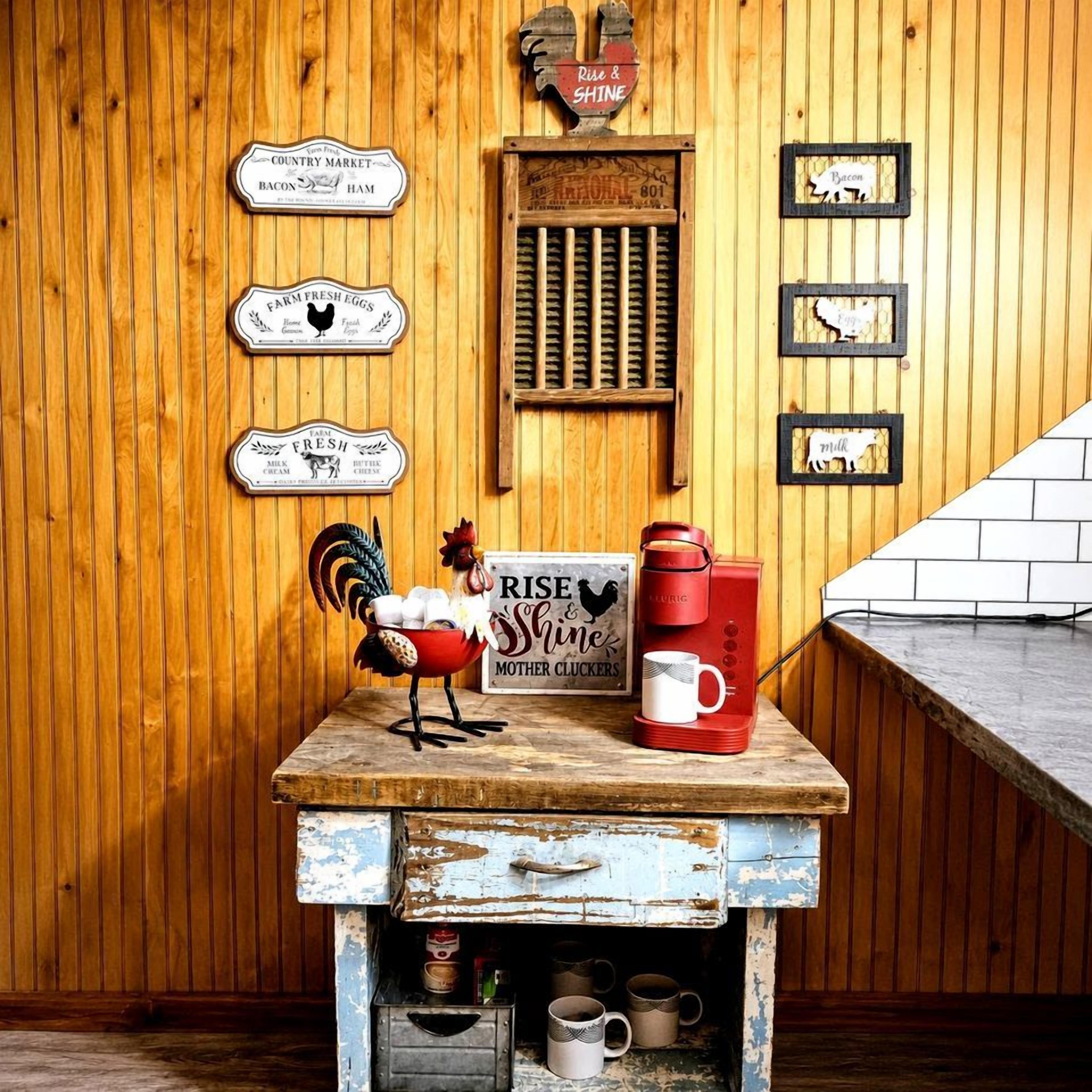 A rustic kitchen with wooden walls, a vintage coffee maker, and farm fresh eggs sign.