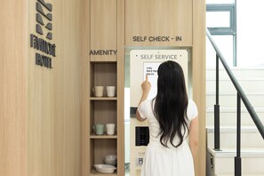 Check-in/check-out kiosk