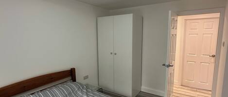 Double Room, City View | Iron/ironing board, free WiFi