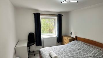 Double Room, City View | Iron/ironing board, free WiFi