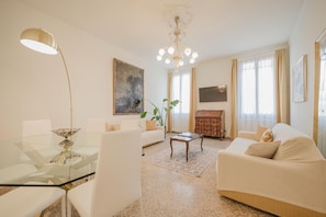 Comfort Condo, City View | Living area | Flat-screen TV