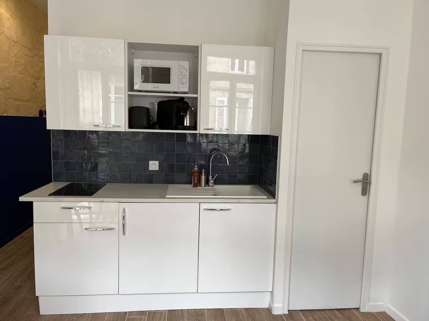 Fridge, microwave, coffee/tea maker, toaster