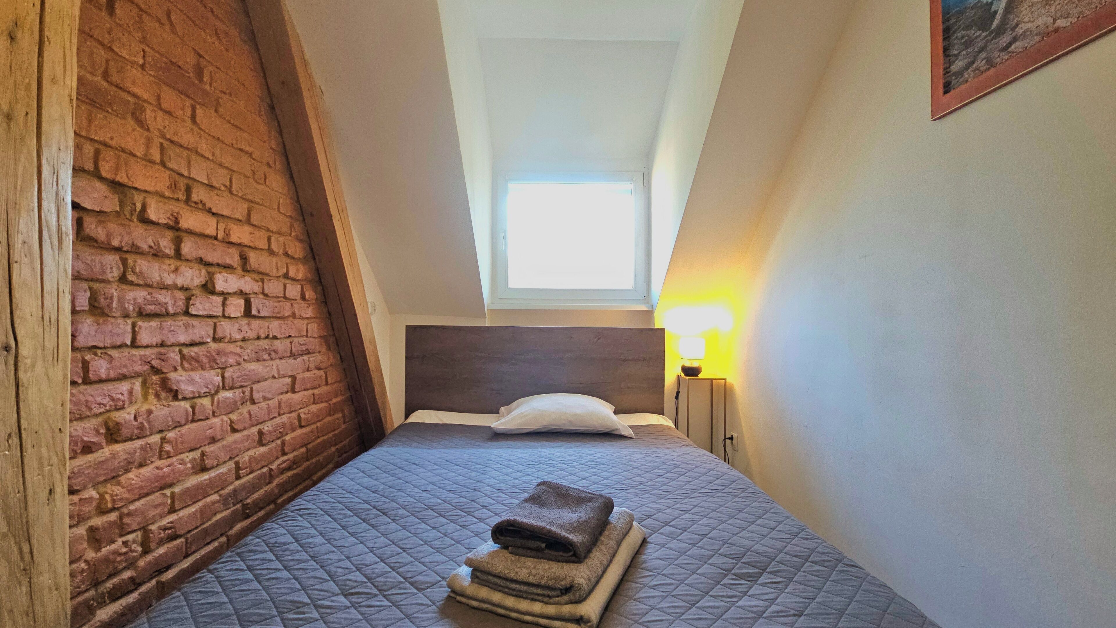 Hypo-allergenic bedding, desk, laptop workspace, iron/ironing board