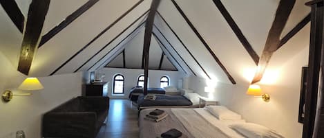 Standard Quadruple Room | Hypo-allergenic bedding, desk, laptop workspace, iron/ironing board