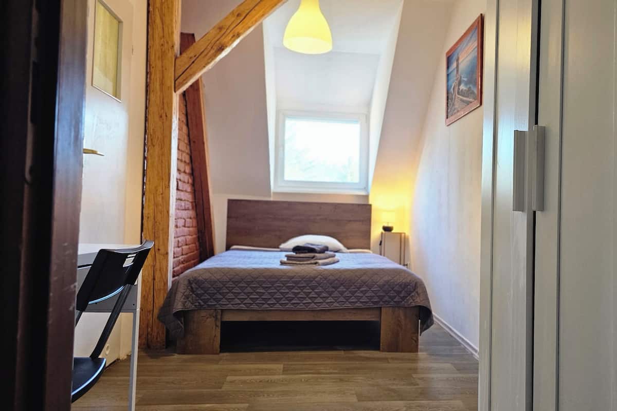 Hypo-allergenic bedding, desk, laptop workspace, iron/ironing board