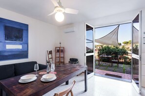 Departamento, 1 habitación, vista parcial al mar | Comedor