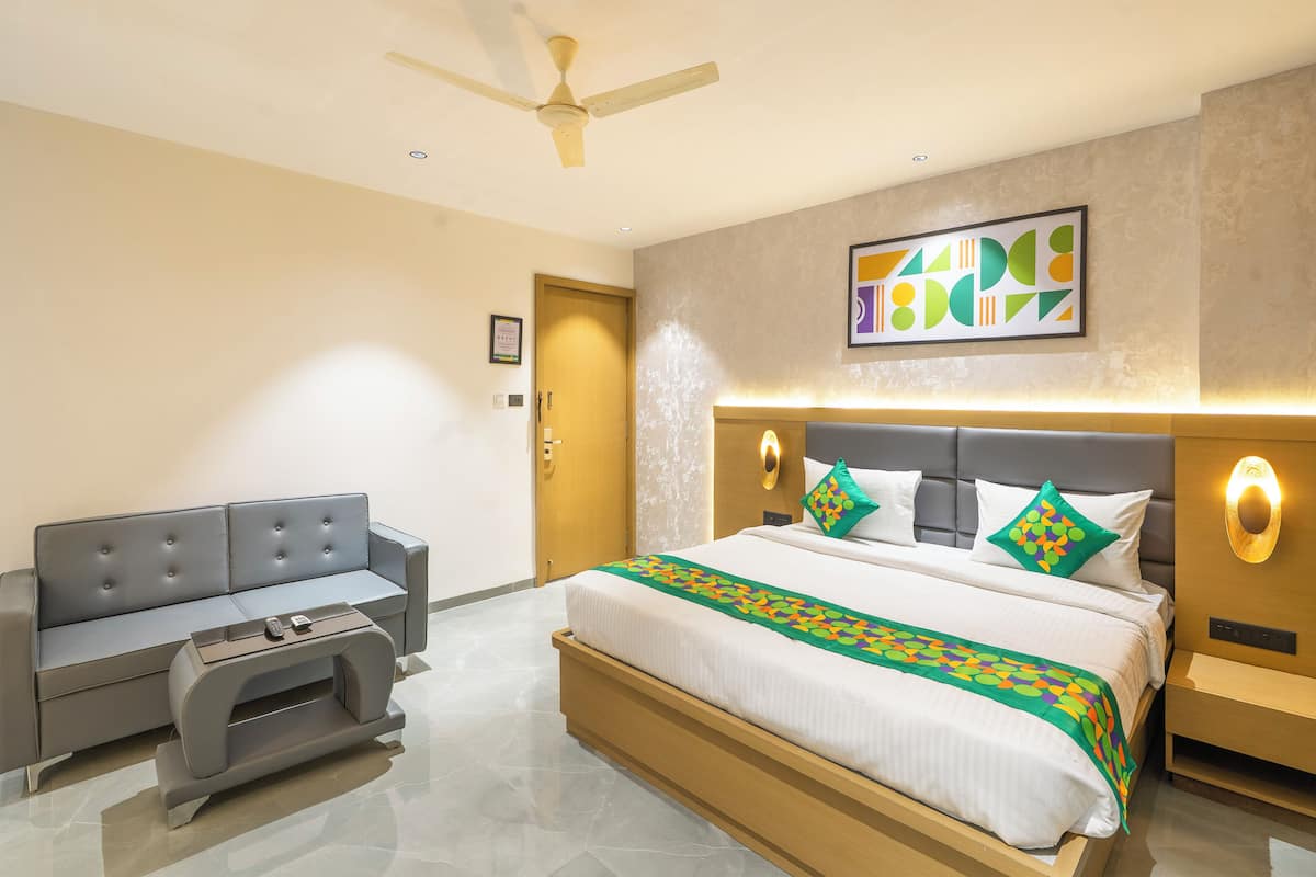 Chambre Double Deluxe | Fer et planche Ă repasser