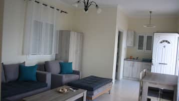Suite, vista mare | Area soggiorno