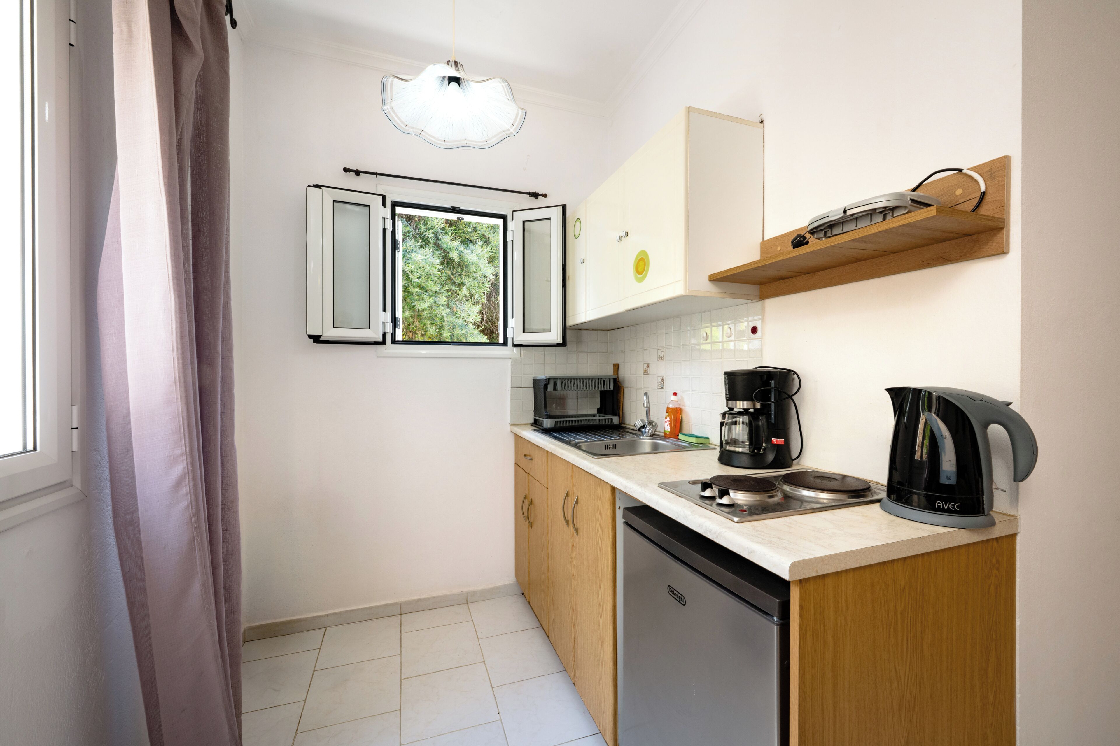 Apartment, Sea View | Private kitchen | Mini-fridge, oven, stovetop, cookware/dishes/utensils