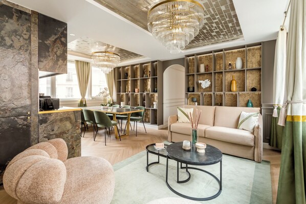 Apartment, City View | Living area | 43-inch Smart TV with cable channels, Netflix, streaming services - Merveil Luxury Suite - Eiffel Fremicourt (Paris)