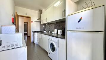 Microwave, coffee/tea maker, cookware/dishes/utensils