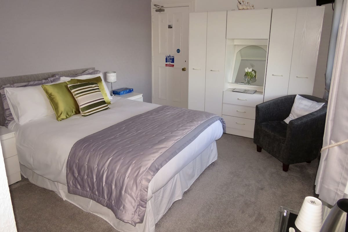 Quadruple Room | Blackout drapes, iron/ironing board, free WiFi