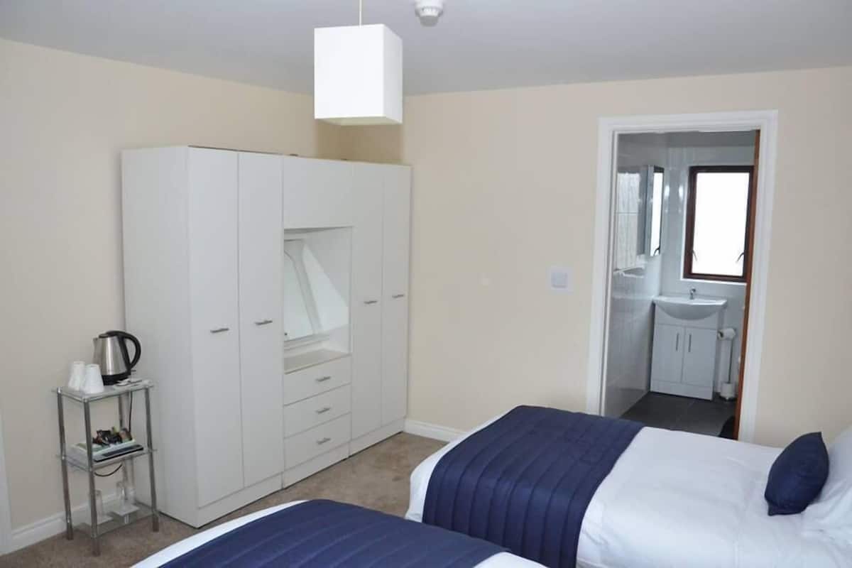 Triple Room | Blackout drapes, iron/ironing board, free WiFi