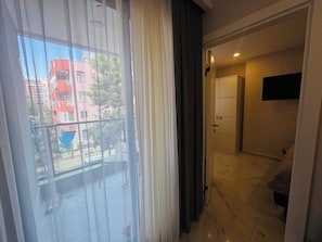 Appartement, uitzicht op resort | Een strijkplank/strijkijzer, gratis wifi