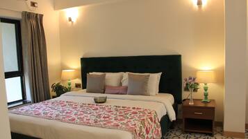 Suite Deluxe, climatisation | Bureau, chambres insonorisées, fer et planche à repasser, Wi-Fi gratuit