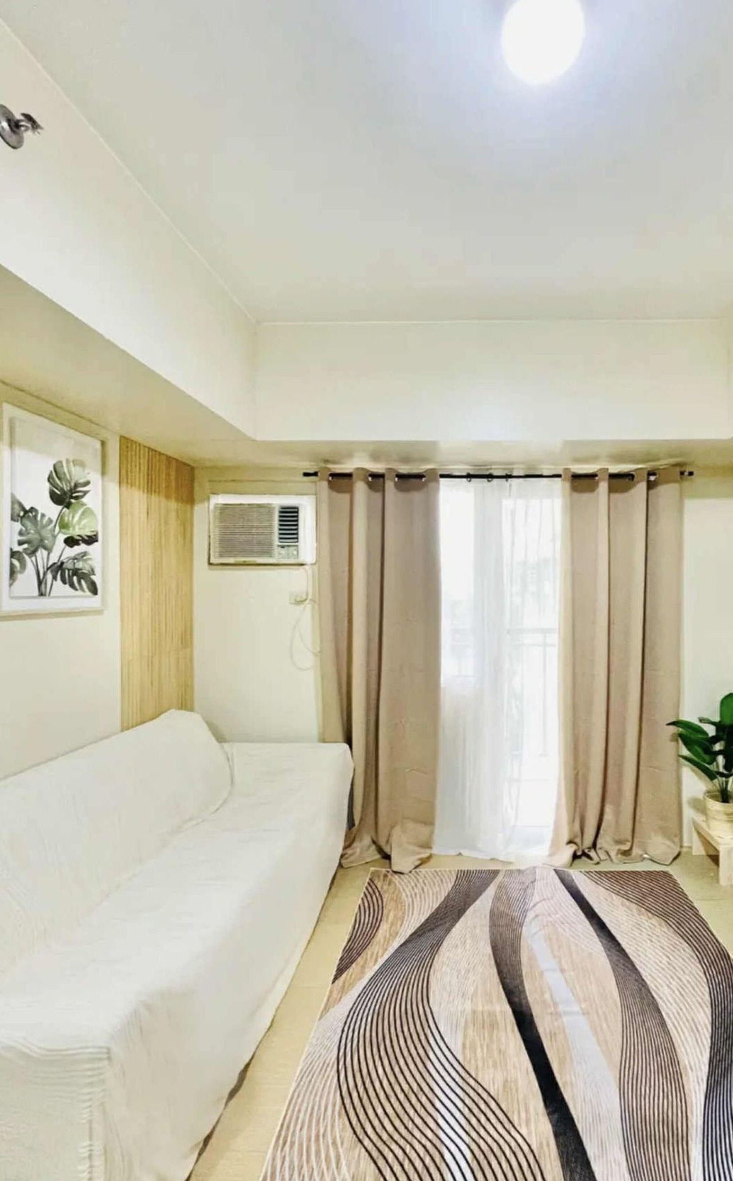 Comfort Condo, 1 Bedroom, Balcony, Garden View | Living room | 30-inch Smart TV with digital channels