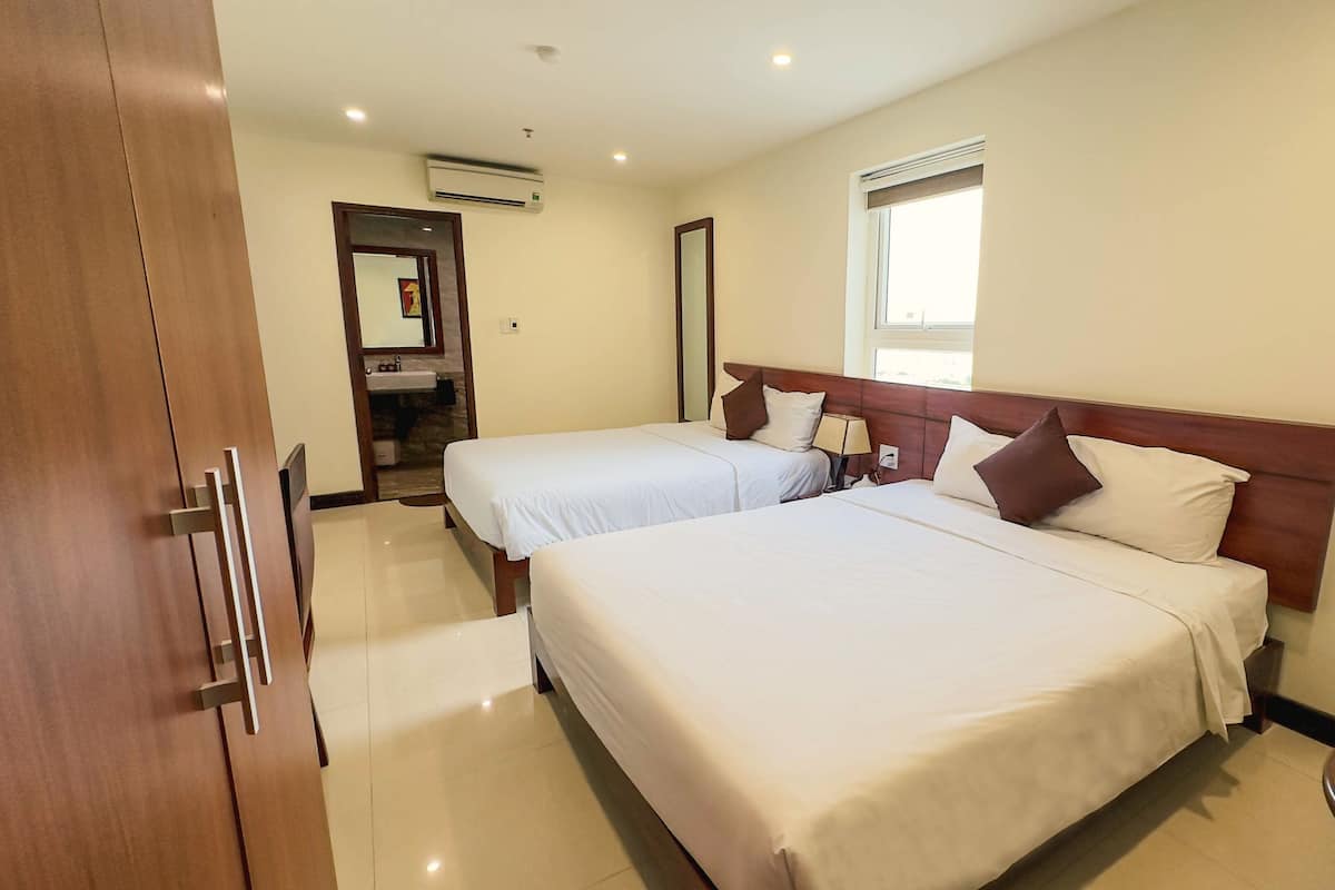 Habitación urbana con 2 camas individuales | Wifi gratis y ropa de cama