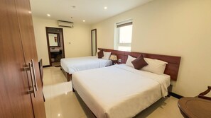 غرفة بسريرين فرديين في المدينة | واي فاي مجانًا وملاءات أسرّة