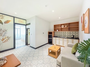 Studio Suite | Private kitchen | Mini-fridge, microwave, stovetop, cookware/dishes/utensils - Sujet Center Hotel by Haviland (Hai Chau)