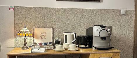 Fridge, microwave, stovetop, cookware/dishes/utensils