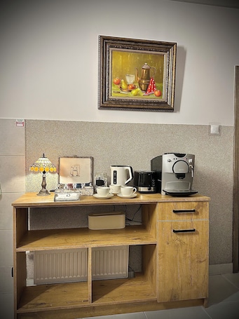 Fridge, microwave, stovetop, cookware/dishes/utensils