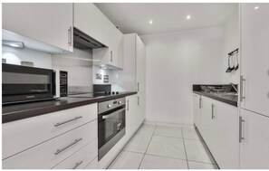 Apartment, Courtyard View | Private kitchen | Fridge, oven, stovetop, dishwasher