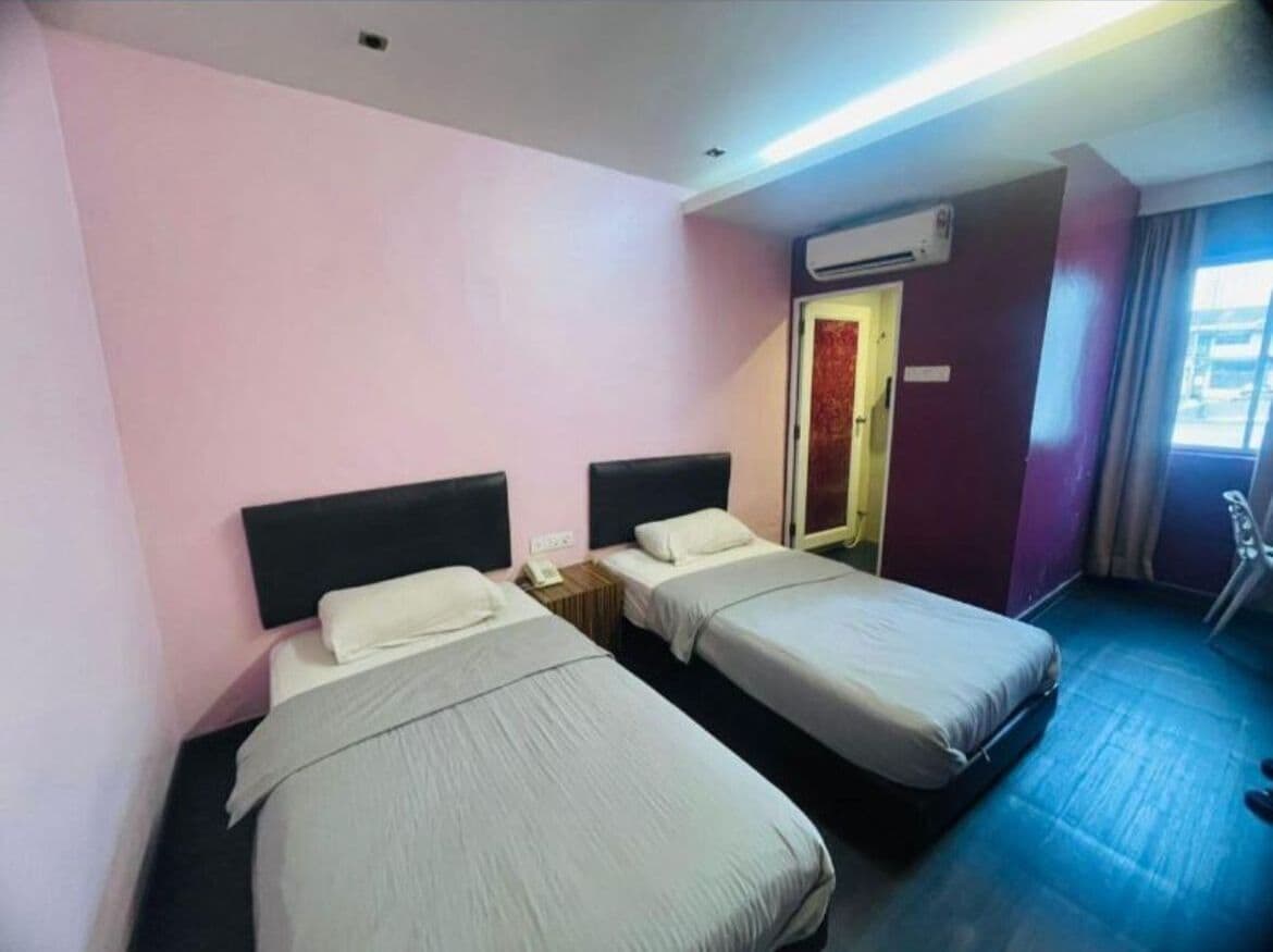 Dubbelrum eller tvåbäddsrum - 2 enkelsängar | Strykjärn/strykbräda och gratis wi-fi